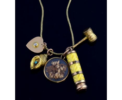  Fine Antique  rope chain in unmarked gold, with pencil in gold plate and yellow enamel, a gold and diamond set heart, and ot