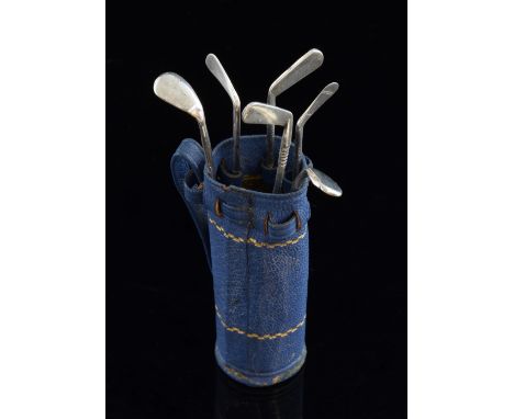 George V Novelty set of silver golf club form picks to include irons, wedges and putter in original weighted leather golf clu