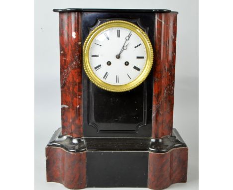 Polished slate and red marble twin train mantel clock 39 x 28 cm PROVENANCE: Consigned from a local deceased estate, the prop