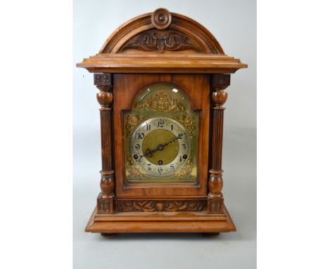 Early 20th century walnut cased triple train mantel clock, 50cm x 32cm PROVENANCE: Consigned from a local deceased estate, th