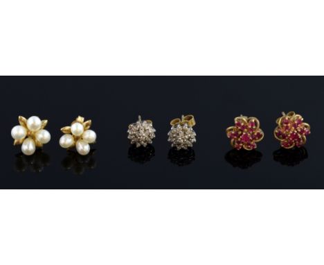 Three pairs of gold ear studs, diamond cluster, ruby and pearl   Gross weight 5.3 grams