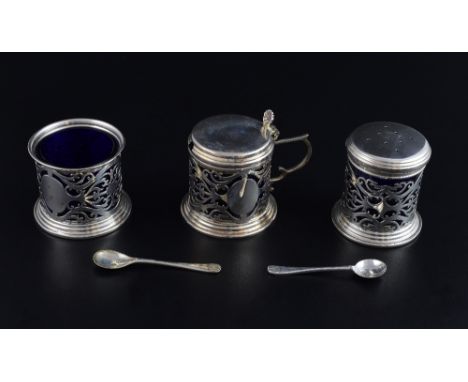 Modern silver three piece cruet set, comprising salt, pepper grinder, mustard pot and cover and two spoons, by W I Boradway &