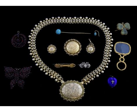 Collection of antique jewellery, including a Victorian silver gilt necklace with large locket on an ornate chain, similar bro