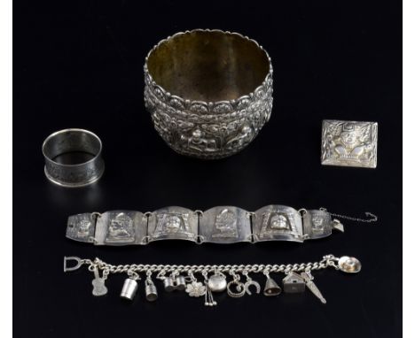 Indian silver sugar bowl with moulded figural and floral decoration, two bracelets, napkin ring and a button, 8.7oz, 273g, 