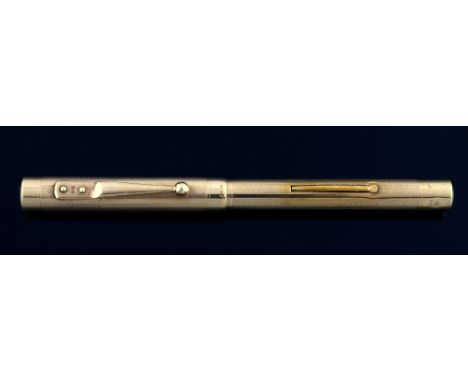  Vintage Swan gold cased fountain pen, with engine turned finish, London import marks, engraved Mabie Todd & Co New York, 9ct