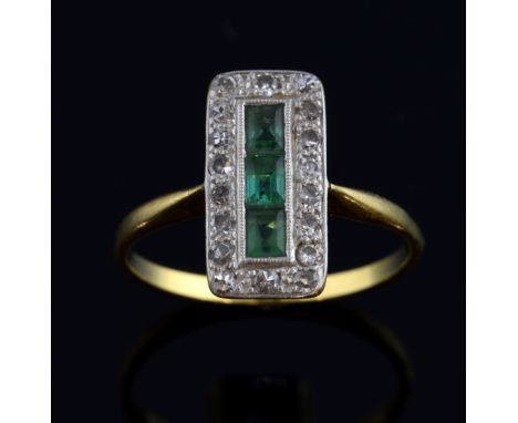 Art Deco plaque ring with three square cut emeralds within a border of small diamonds, in unmarked yellow metal.  Ring size M