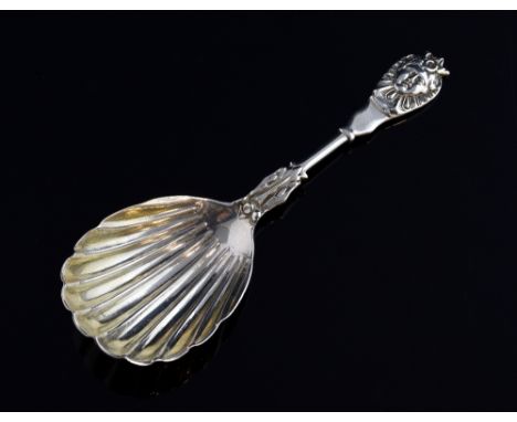 Victorian silver caddy spoon with fluted bowl and mask terminal, by H J L, London, 1877, 