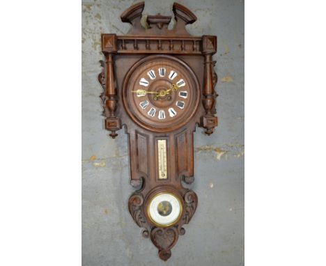 American walnut wall clock/ barometer, two other clock cases and American clock case  PROVENANCE: Consigned from a local dece