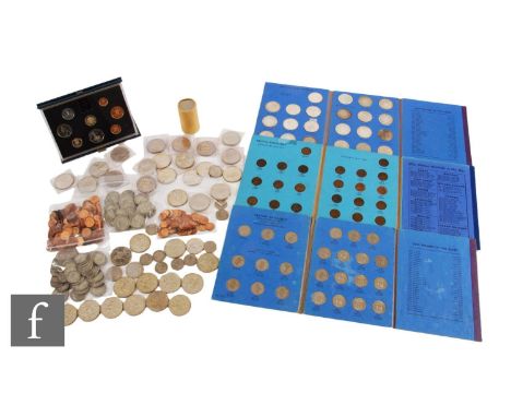 George V - Various half crowns, 1911 to 1940, in Whitman folder, two other folders of shillings and farthings, a cased set of