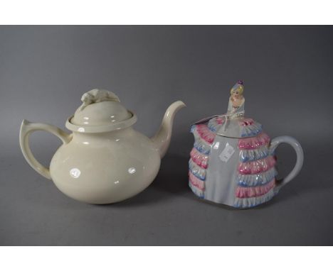 A Painted Lady Teapot "As Purchased by Her Majesty Queen Mary" Together with a Spode Supex Teapot with Lioness Finial 