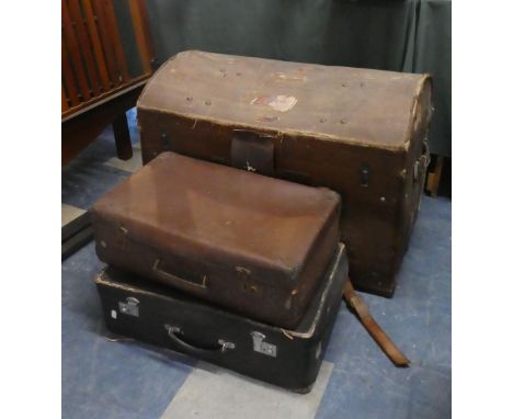 A Canvas Covered Dome Topped Travelling Trunk, 79cm Wide Together with Two Vintage Suitcases 