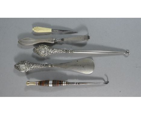 A Collection of Button Hooks, Shoe Horns etc to Include Two Silver Handled Examples 