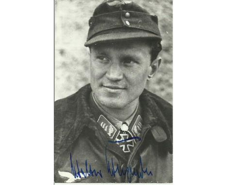 Walter Krupinski autographed photo. Black and white 6x4 portrait photograph autographed by WWII Luftwaffe ace Walter Krupinsk
