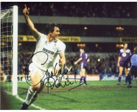 TOTTENHAM HOTSPUR: 8x10 inchphoto hand signed by former Spurs & England defender Graham Roberts,pictured scoring for Spurs in
