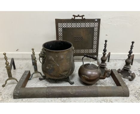 A late Victorian embossed coal container with lion mask ring handles, on three lion's paw feet, with all-over foliate applied