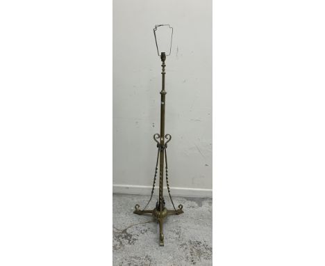 A circa 1900 brass telescopic lamp standard on barley-twist decorated scroll foot tripod base, approx 132 cm high including b