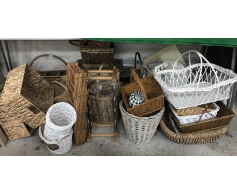 A large collection of assorted baskets, wine racks, plus two mirrors