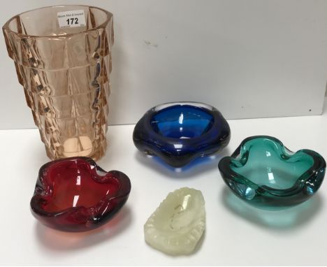 A pink glass shallow conical vase of stepped faceted form, 14 cm diameter x 20 cm high, together with three coloured glass as