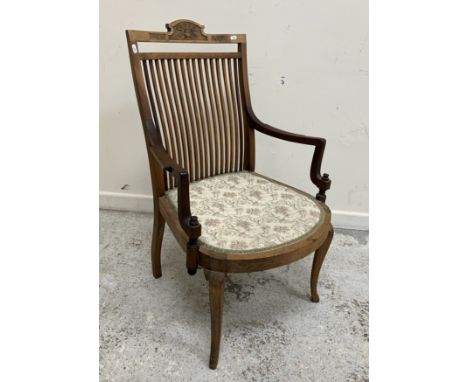 A Victorian stained pine stool with upholstered rectangular seat, the frieze decorated with applied motifs of pigs, the corne