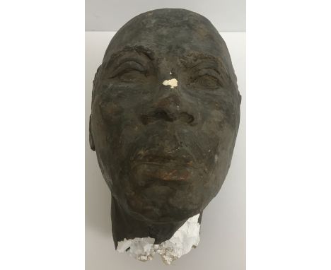 A bronze patinated plaster head study of "A gentleman of African origin with bald head", approx 26 cm high