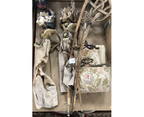 Two Indonesian painted wooden puppets, each of a dancer, a cane work carpet beater, a miniature bow and two arrows (from Pigm