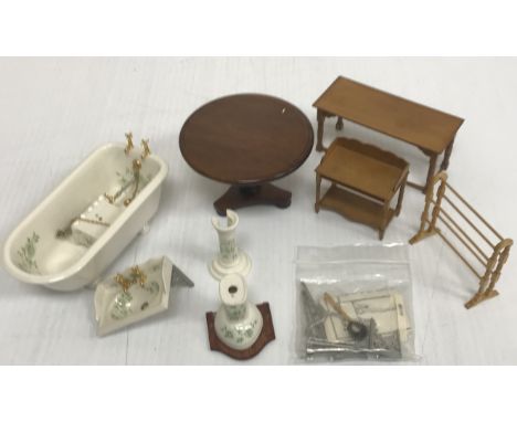 A Jane Newman doll's house washstand and refectory table, a David Booth round table and an Ann Shepley Ceramic Design bath, t