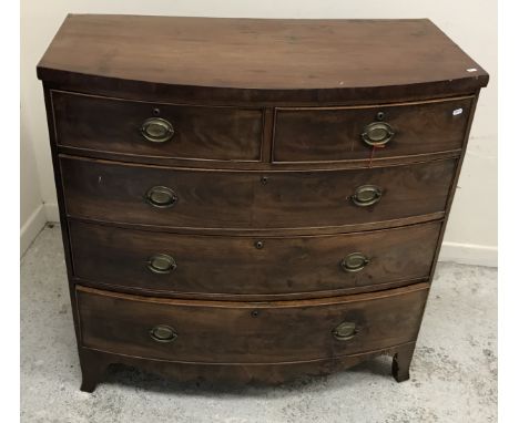 A 19th Century mahogany bow fronted chest, the plain top over two short and three long graduated drawers and a shaped apron t