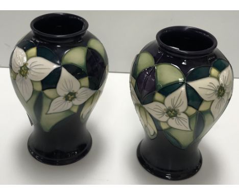 A Moorcroft "Trillium" pattern baluster shaped vase, bearing various impressed and signature marks to the base for Nicola Sla
