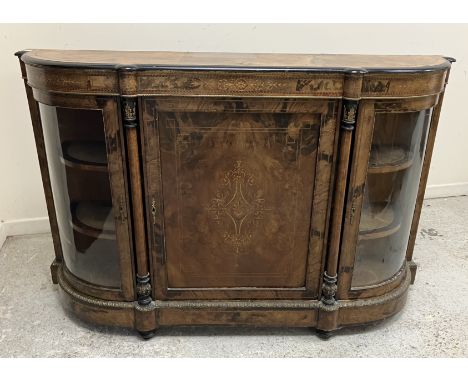 A Victorian walnut and marquetry inlaid credenza, the top with ebonised moulded edge, over a decorative frieze and central cu