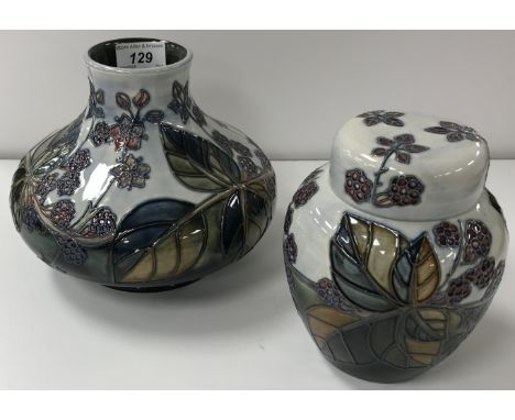 A Moorcroft "Bramble" pattern squat baluster shaped vase, bearing impressed marks and dated "1999", 16 cm high, together with