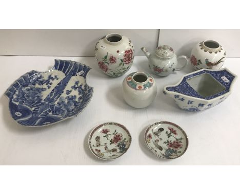A box containing a collection of various Chinese and other porcelain including a famille-rose ginger jar with concentric ring