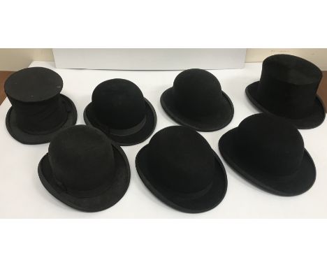 A collection of five various bowler hats, to include a Moss Bros bowler hat, 22¼" circumference, a Foster Brothers, 21¼" circ