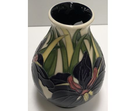A Moorcroft "Iris Louisiana" pattern baluster shaped vase by Rachel Bishop, date marked for "2013", signed and No'd. "12/50" 