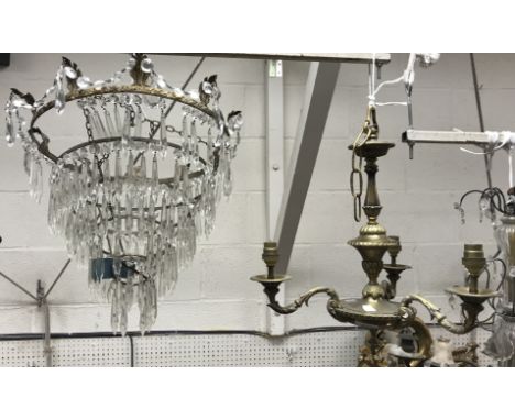 A 20th Century cast brass three light electrolier in the Empire taste, approx 41 cm diameter x 45 cm high and a five tier cut