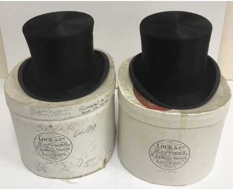 A Scott & Co. black silk top hat, 21¼" circumference, housed in a Locke & Co. hat box, a Locke & Co. black silk top hat, 22¼"