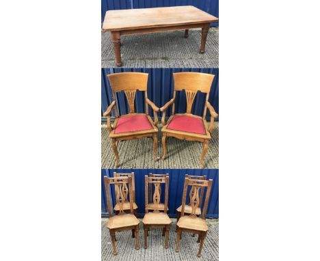 A circa 1900 oak dining table in the Arts and Crafts style, the four plank top over a plain frieze on turned and ringed taper