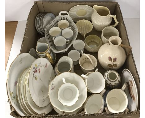 A collection of various china wares to include a Belleek green back stamp shell cup and saucer, together with shell decorated