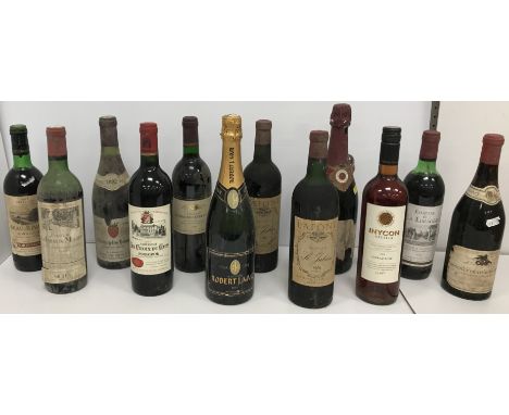 A mixed case of twelve various wines including Beau Rivage Bordeaux 1975, Chateau La Croix de Gay Pomerol 1987, Chateau La Cr