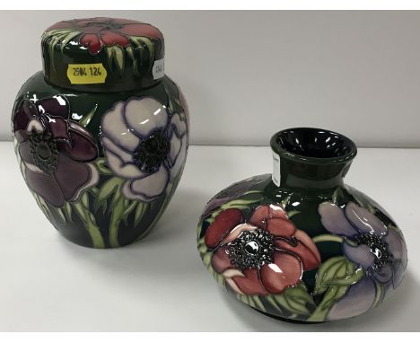 A Moorcroft "Anemone" pattern ginger jar, date marked for "2003", with original price tag "£298", 15.5 cm high, together with