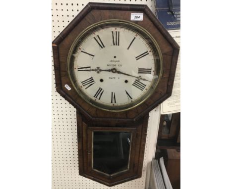 A rosewood cased drop dial wall clock, the octagonal upper casing enclosing a painted dial and eight day movement with Roman 
