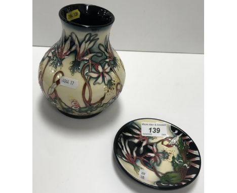 A Moorcroft "Minuet" pattern vase of baluster form by Nicola Slaney, dated "2006", bearing original price tag "£378", 15.5 cm
