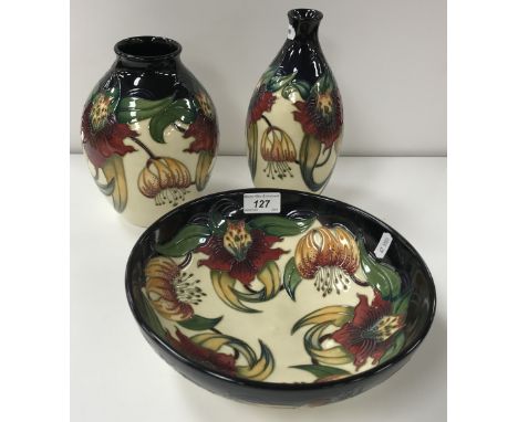A Moorcroft "Anna Lily" pattern fruit bowl, date marked for "2008", by Nicola Slaney, bearing old price tag "£448", 26 cm dia