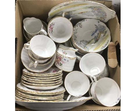 A Royal Crown Derby "Derby Posies" part tea set and a Royal Albert "Rosedale" tea set comprising cake plate, six saucers, fiv
