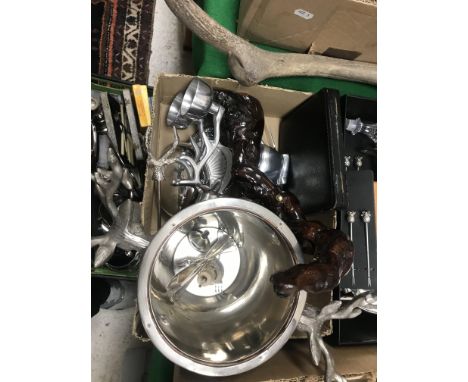 Two boxes of various plated wares to include stag's head decorated ice bucket, stag's head decorated aluminium candle holder,