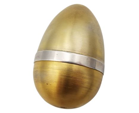 A Stuart Devlin silver and silver gilt Surprise Egg with an elf sat on a toadstool to the interior, makers mark London 1975, 