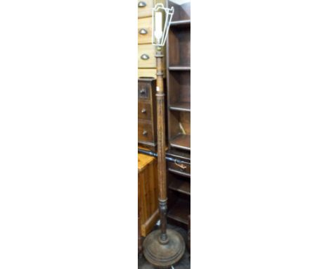 A fluted column lamp standard