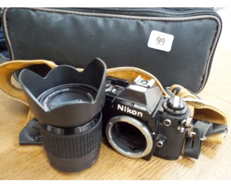 A Nikon camera with lens