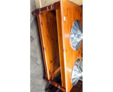 A Ducal pine coffee table with shelf under on turned legs approx 1 meter long