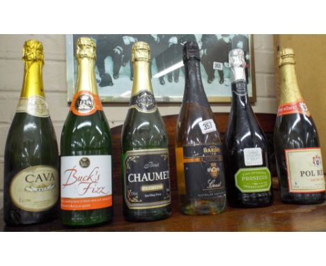 Six various bottles of champagne and sparkling wine etc