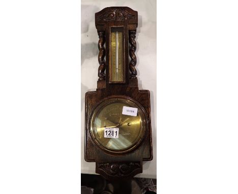 Carved oak and brass barometer/thermometer H: 50 cm. Not available for in-house P&amp;P, contact Paul O'Hea at Mailboxes on 0